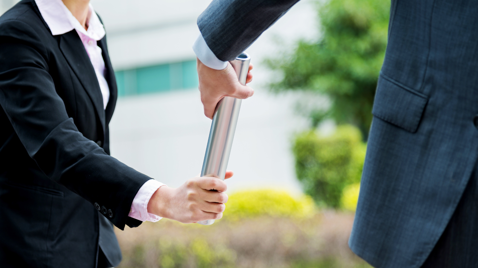 Baton being passed between CEOs